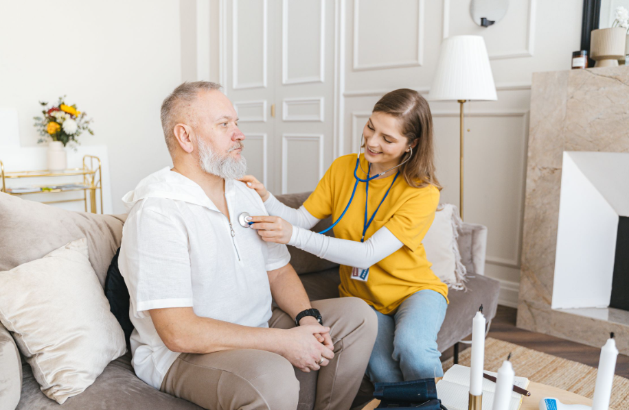 A nurse performs a routine checkup as part of comprehensive home health care in Newark, NJ.