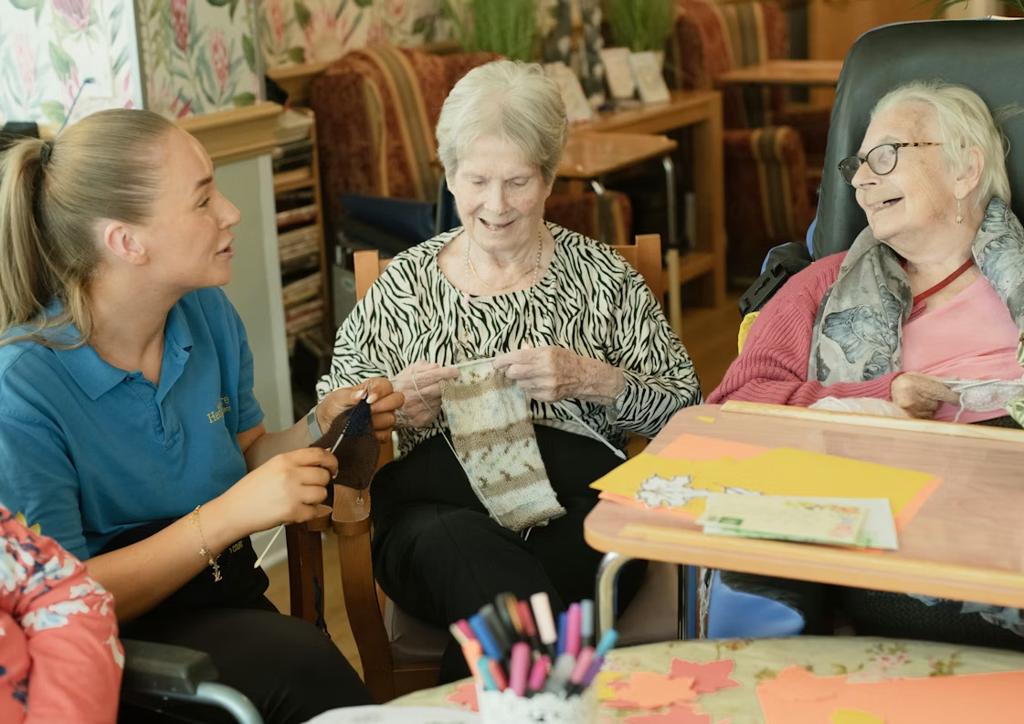 Senior home care caregiver spending meaningful time with older adults during a daily activity