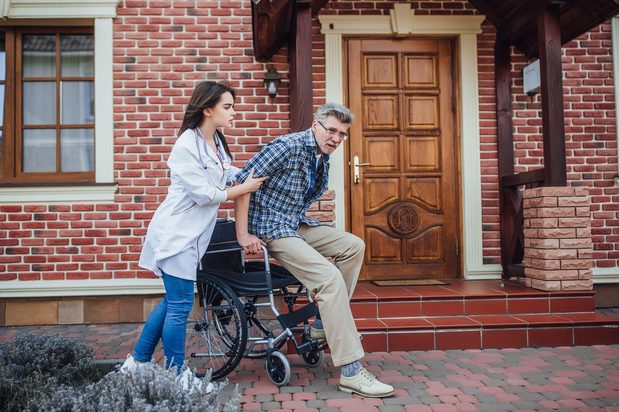 Home health aide in New Jersey assisting a senior with mobility and daily support